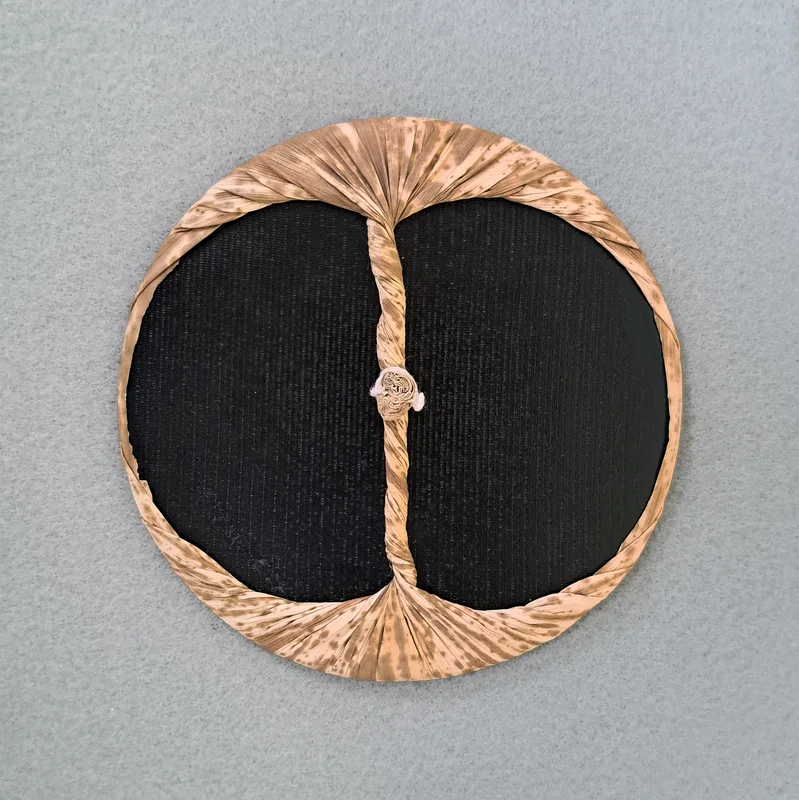 A traditional baren used in Japanese woodblock printing